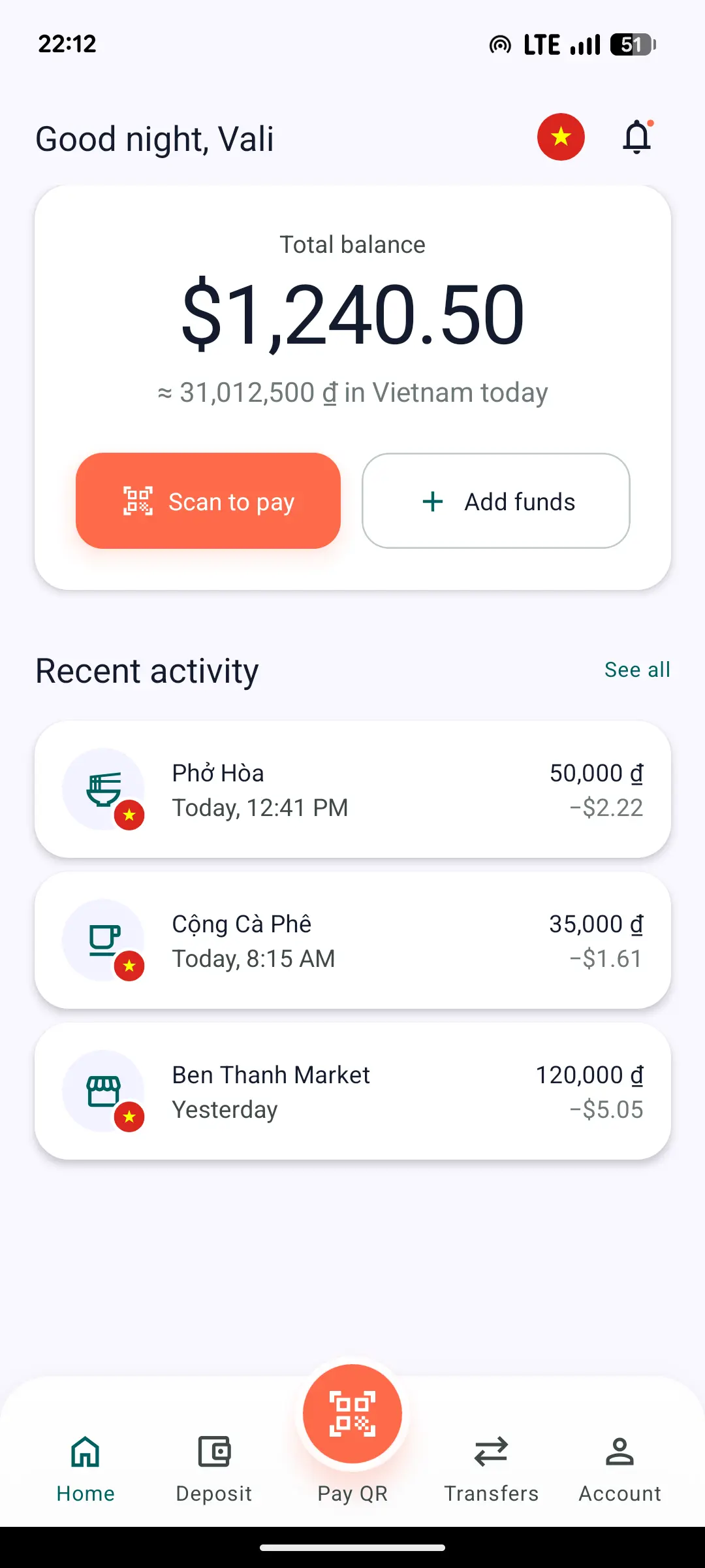 Valuto home screen: a $1,240.50 balance shown as roughly 31 million Vietnamese dong, with a Scan to pay button and recent QR payments at local street food places